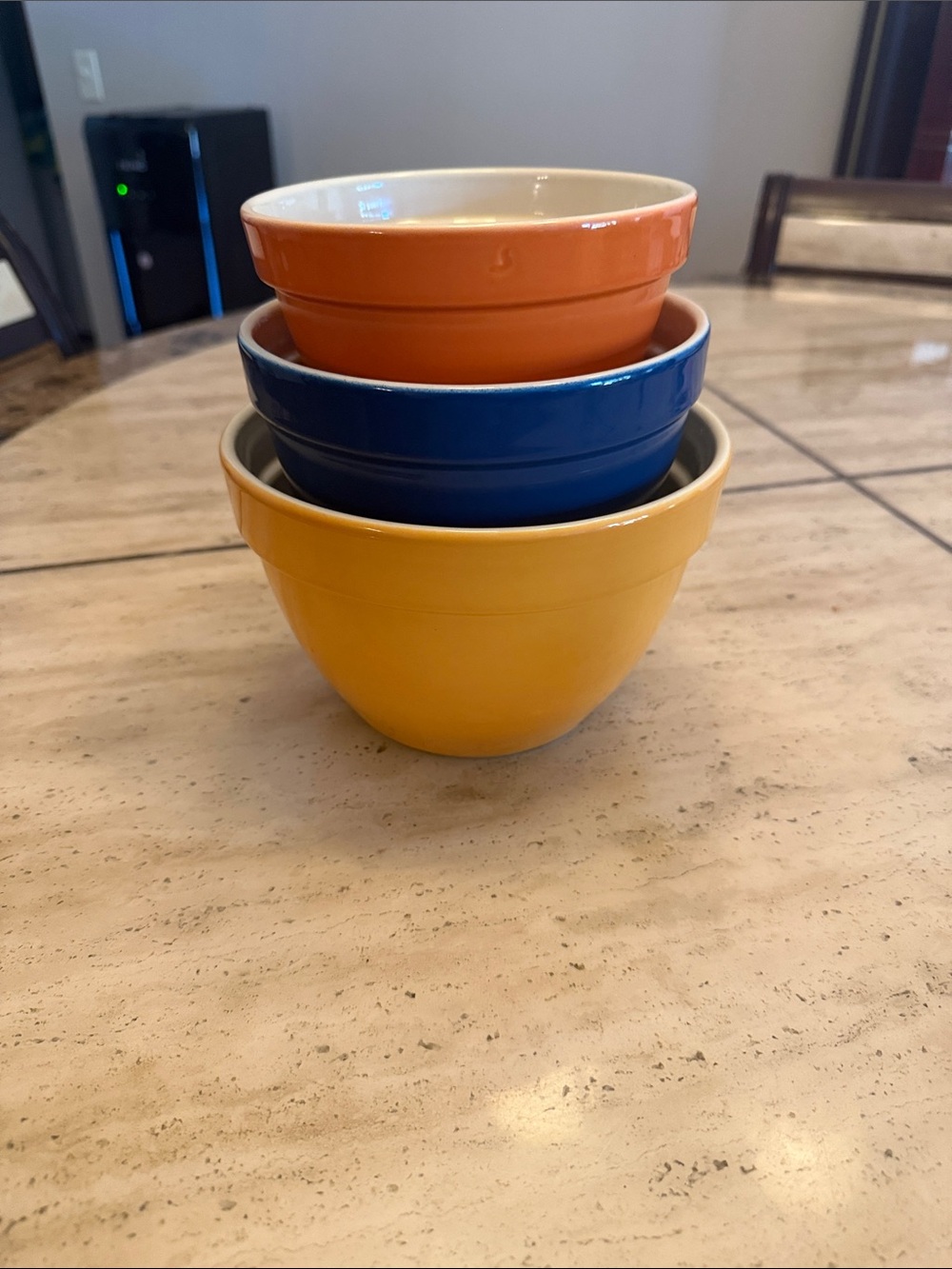 Crate&Barrel Stackable Ceramic Mixing Bowls in Yellow, Blue, and Orange